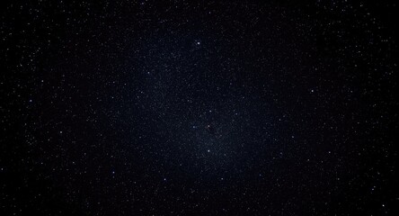 Fototapeta premium Glowing intense starry night sky deep space backdrop