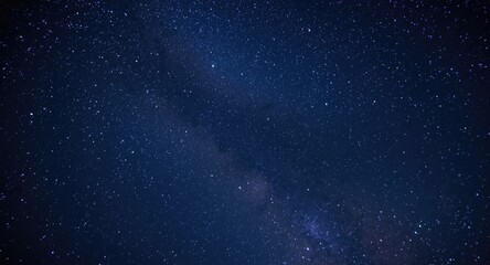 Fototapeta premium An impressive star filled night sky showcasing a cosmic spectacle far from urban lights