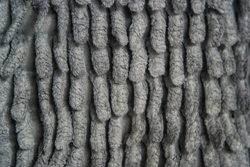 Fototapeta premium A top-down shot of grey chenille microfiber fabric.