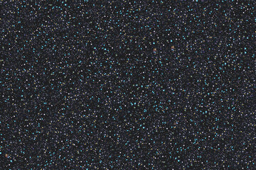 Dark gray glitter texture background with subtle iridescent flecks, sparkling metallic dust surface for festive design