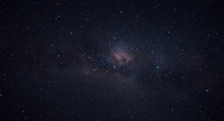 Obraz premium A panoramic night sky filled with bright stars, colorful nebulae, and distant galaxies on blackness