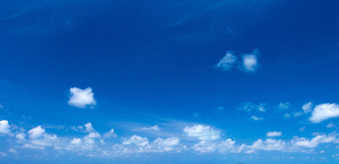 Blue sky background with tiny clouds. clouds in the blue sky