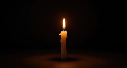 Luxurious dark backdrop featuring a glowing golden flame on a seventy fifth birthday candle