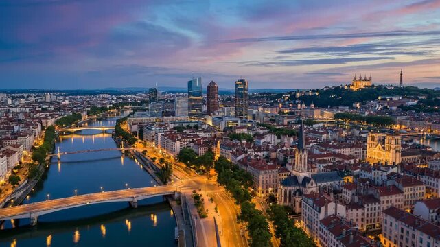 aerial drone view of Lyon skyline in France with Rh&ocirc;ne and Sa&ocirc;ne rivers timelapse video