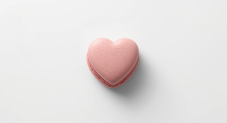 Obraz premium Heart shaped sweet on white surface designed for culinary project advertisements