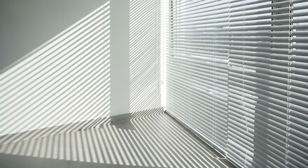 Obraz premium Sunlight Streaming Through Window Blinds Interior.