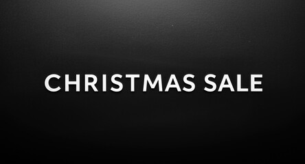 Obraz premium Christmas sale announcement text arranged on a clean black background