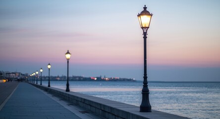 Obraz premium Gentle seaside environment capturing street lamps against peaceful water and sky