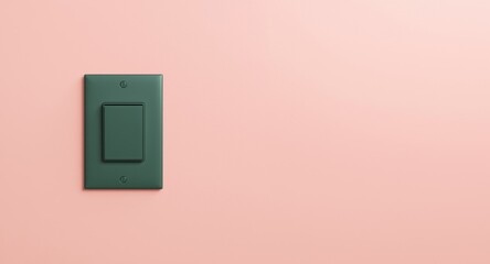 Flat green switch on a baby pink painted wall with copy space for text