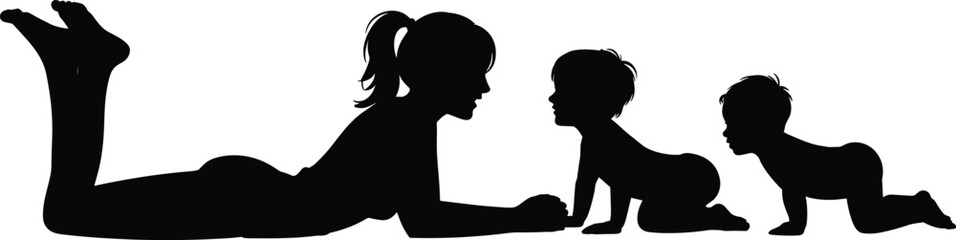Black silhouette of a young mother lying on the floor playing with two crawling twin babies representing family bonding motherhood and childcare isolated on white