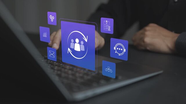Customer relationship management concept. Professional working on laptop with CRM system icons, customer database, analytics, lead management and digital business strategy.