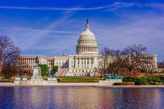 Washington, DC&mdash;Mar. 10, 2013; U.S. Capitol and Grant Memorial reflected in Capitol Reflecting Pool on clear early-spring morning