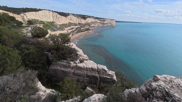 Panoramic wide angle view of Zapalo Bay and cliffs in Limassol, Cyprus.