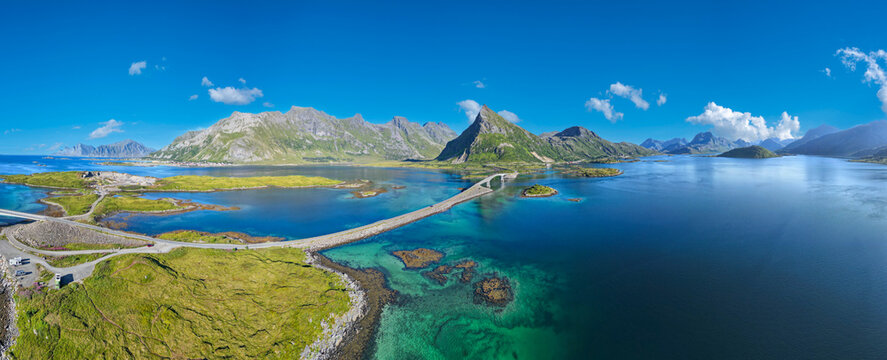 Aerial view near Fredvang with a view of the Fredvang Bridges and the distinctive peak of Volandstind. Lofoten, Norway