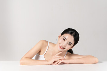Fototapeta premium Portrait of beautiful young asian woman with healthy face skin and body skin, isolated on white background, for make-up product, skincare and cosmetic concept. 