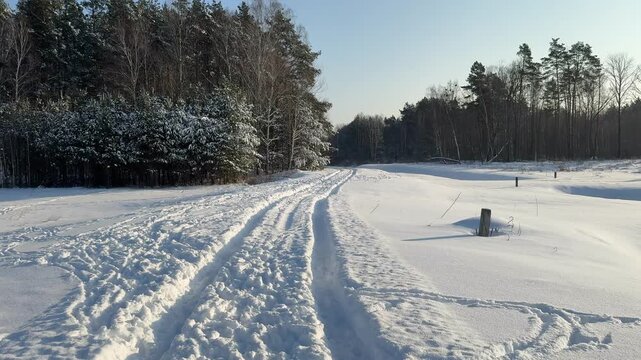 The road is covered with a lot of snow.
