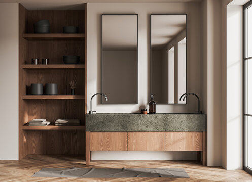 Modern bathroom interior with wood shelving, dual mirrors, and stone countertop, minimalist design on neutral background. Concept of home design. 3D Rendering