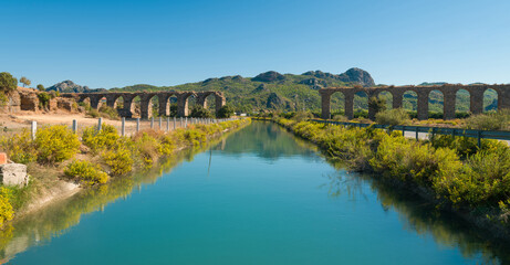Obraz premium Aqueducts and water channels of Aspendos Ancient City. Antalya city. Türkiye
