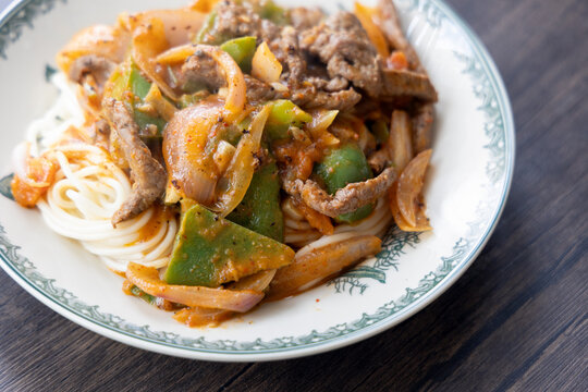 Close-Up of Xinjiang Laghman Noodles with Stir-Fried Lamb (Guo You Rou), Hand-Pulled Noodles