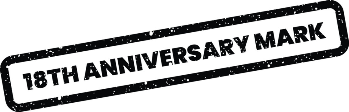Grungy rubber stamp impression with 18th Anniversary Mark text, indicating an important commemorative designation or seal