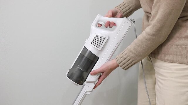 Howling and rumbling when turning on a handheld corded vacuum cleaner
