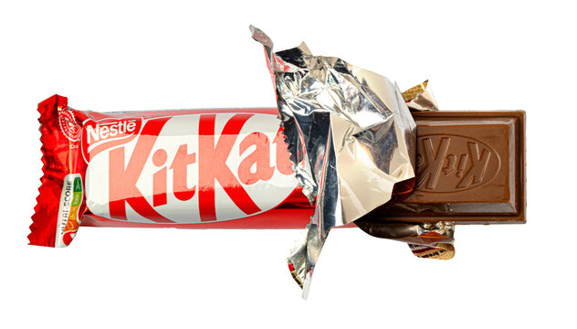 Kitkat chocolate bar unwrapping revealing delicious snack treat