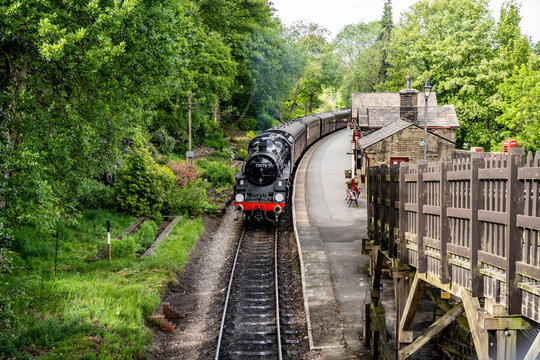 The historic steam locomotive of the Keighley and Worth Valley Railway at Haworth Station, evocative experience in the Bront&euml; Country, Yorkshire, England, United Kingdom.