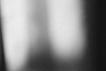 Monochrome abstract gradient texture with vintage film noise.
