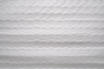 Fototapeta premium Side View of White Fabric Mattress Texture With Quilted Pattern