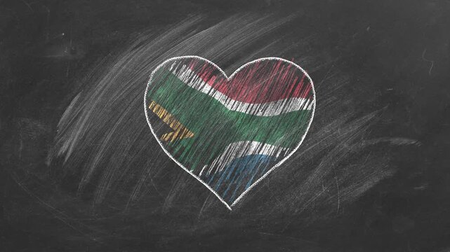 National flag of South Africa in heart shape  drawn with colored chalk on a blackboard