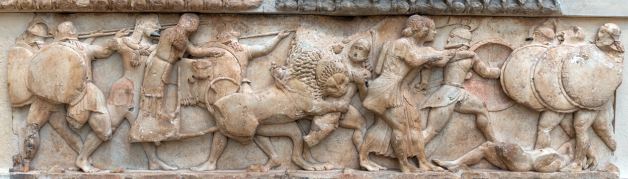 Ancient Greek relief sculpture of the battle of the giants from the Siphnian Treasury, Delphi, Greece
