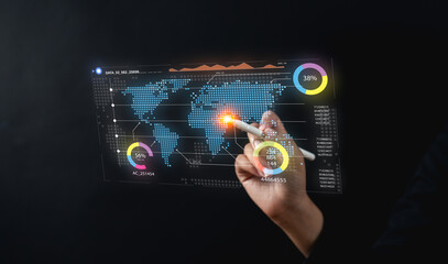 Fototapeta premium A hand interacts with a digital map, presenting data visualizations and statistics on a sleek, futuristic touchscreen interface.