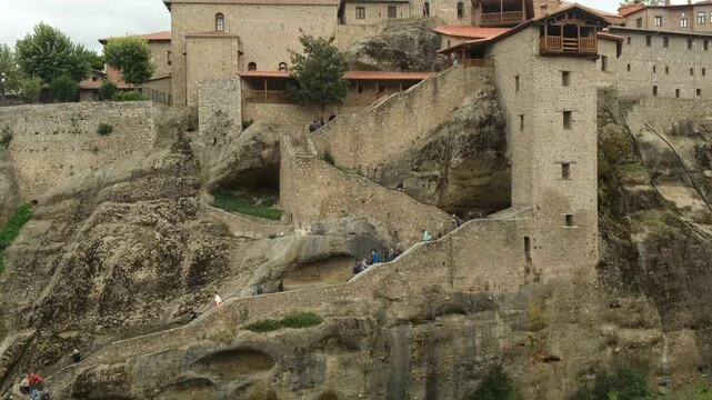 a staircase in the rock leading to one of the Meteora monasteries