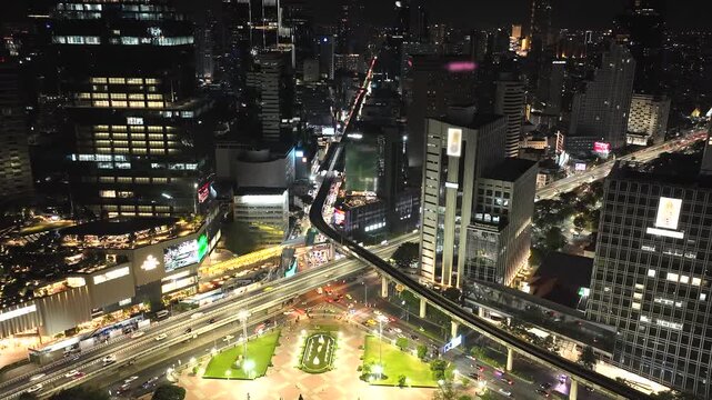 Bangkok City Night Timelapse with Traffic and Skytrain, Urban Business District
