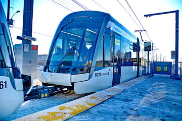 Fototapeta premium Toronto, Ontario, Canada, February 8, 2026: Opening day of the Line 5 Eglinton Crosstown LRT. After 15 years of construction, the 19 km, 25-station, east-west transit line finally opened on this day t