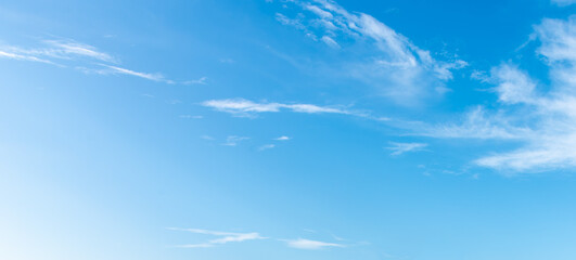 Blue Sky with Few White Clouds