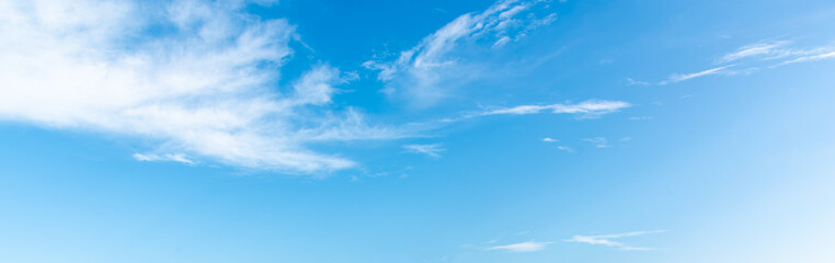 Blue Sky with Few Clouds