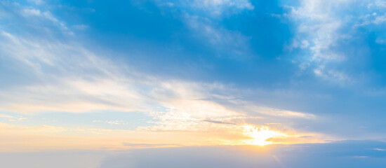 Sunset Sky with Sun in the Lower Third and Open Cloud Space