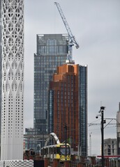 Modern buildings under construction  symbolising urban growth in Manchester UK. Manchester England. 
