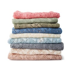 A stack of colorful knitted blankets displayed in a neat pile