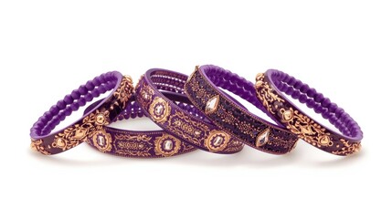 A collection of purple and gold beaded bracelets displayed together