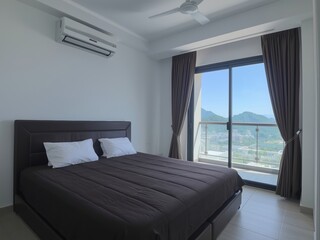 Modern bedroom with a balcony overlooking a scenic mountain view and a large bed