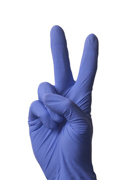 Victory sign gesture surgeon glove hand isolated on transparent layered background.