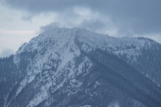 A winter view of the Valsassina seen from the "pian delle betulle", one of the most panoramic points in the area on the mountains , near the town of Casargo, Lombardy, Italy - February 2026