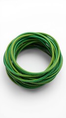 A vibrant green rope coiled neatly on a plain white background.