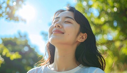 Serene Woman Enjoying Sunlight in Natures Embrace.