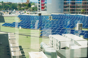 Rooftop solar farm above modern offices, solar output cuts emissions, solar investment fits ESG strategy, sustainable city energy concept for green business, climate content