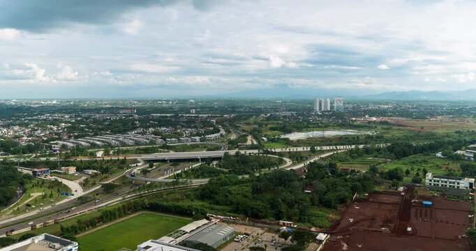 Timelapse of a busy highway intersection in Jakarta outskirt (BSD) in the afternoon