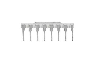 White ceramic DIP microchip with metal pins is isolated, front side.