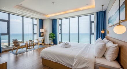 Fototapeta premium A luxurious bedroom with a stunning ocean view and modern furnishings